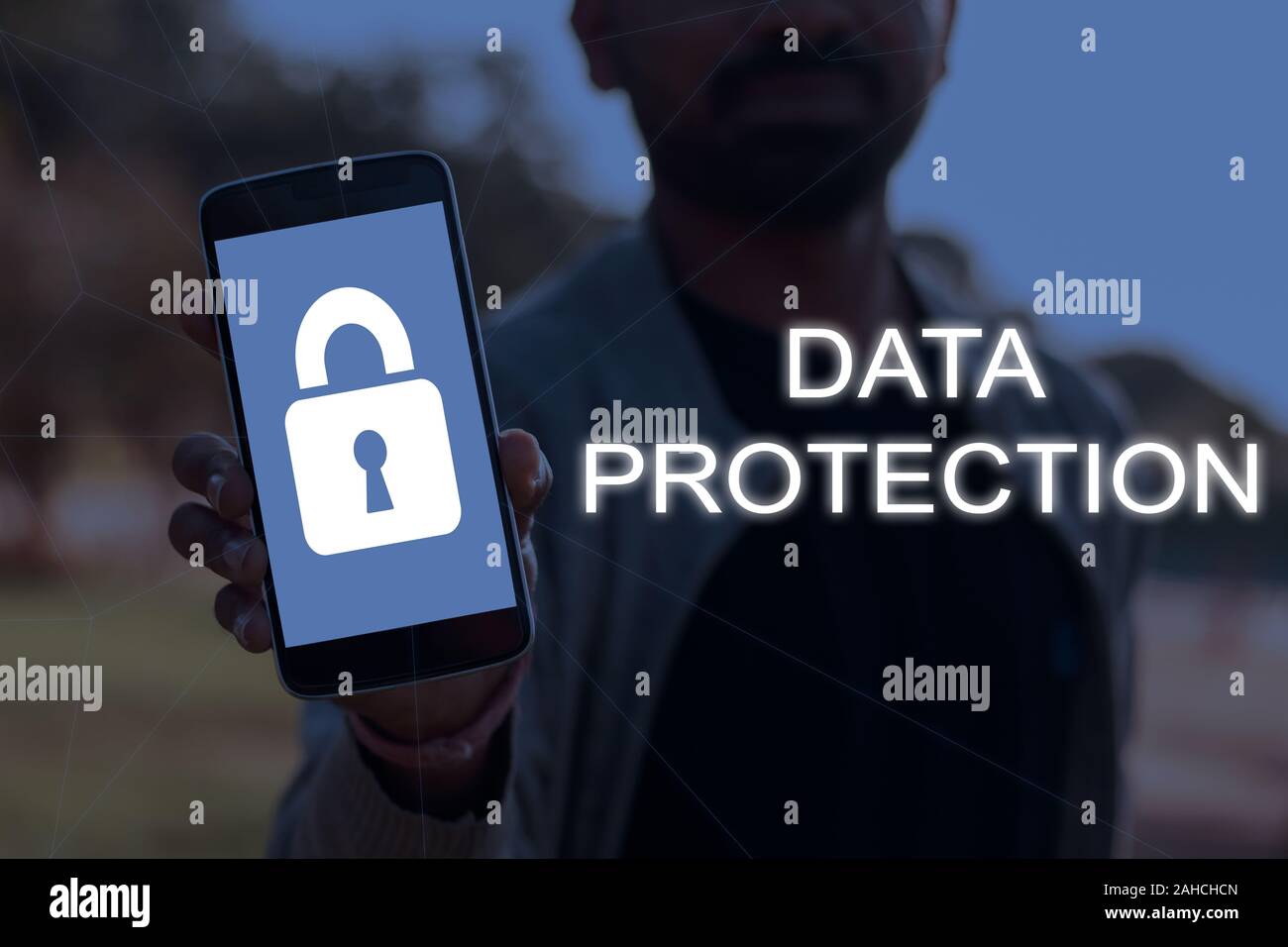 Cybersecurity and data protection concept with a person showing ...