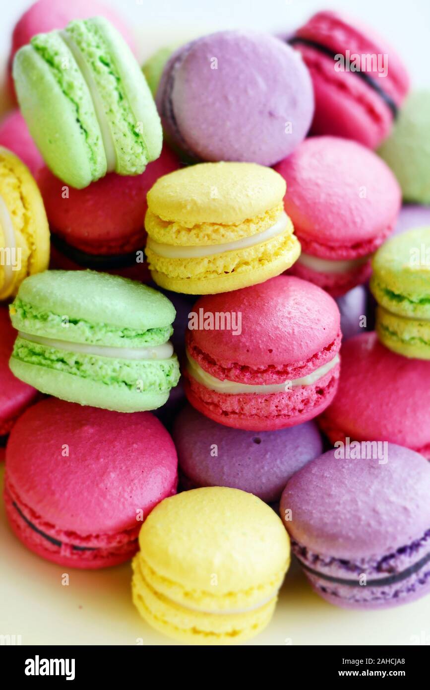 Colorful macarons cakes. Small French cakes. Top view. Pastel colors ...