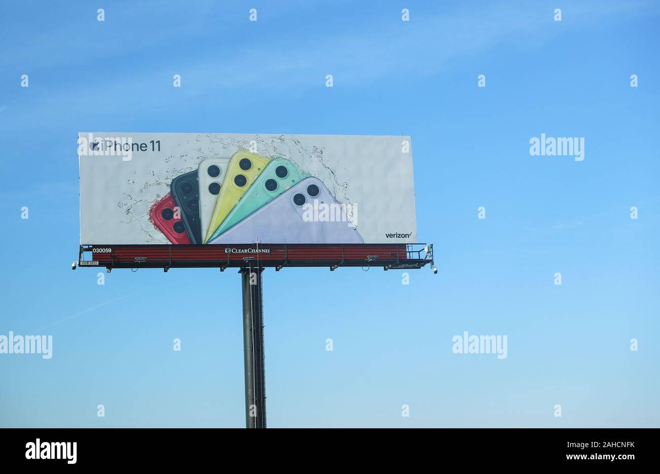 New Jersey December 26, 2019: A billboard advertising the iPhone 11 pro which on the highway - Image Stock Photo