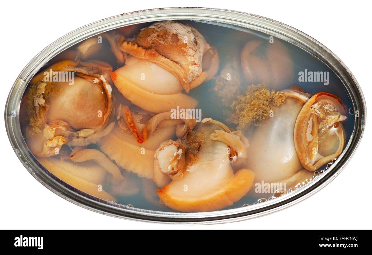 Marinated shellfish in an open tin can. Isolated over white background ...