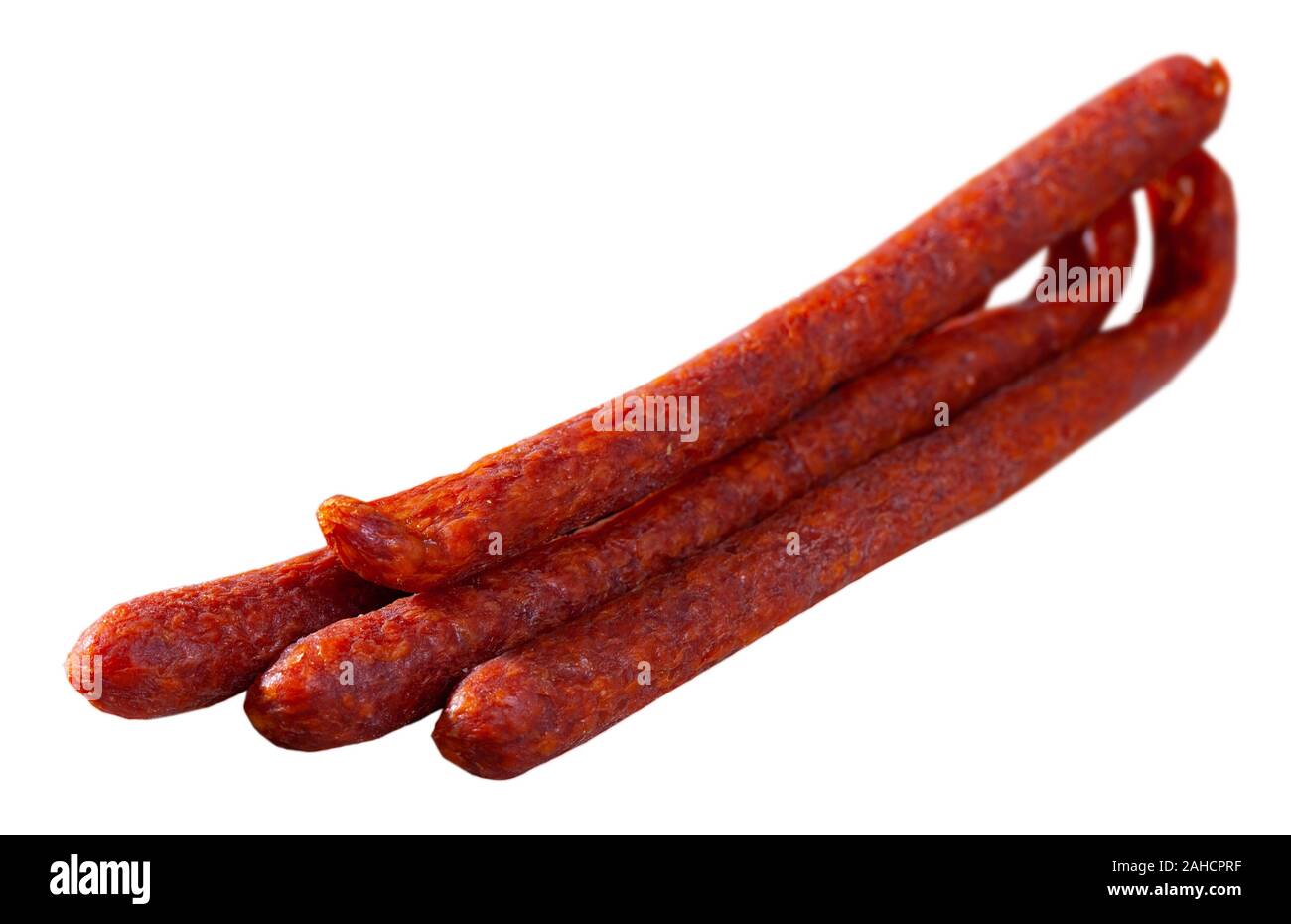 Appetizing Czech pork sausages traditionally smoked with cold smoke from aged beech. Isolated over white background Stock Photo
