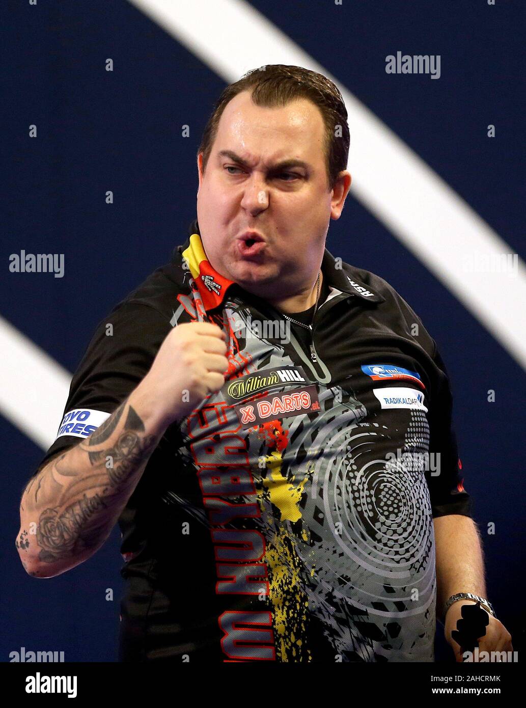 Kim Huybrechts reacts during day thirteen of the William Hill World  Championships at Alexandra Palace, London Stock Photo - Alamy