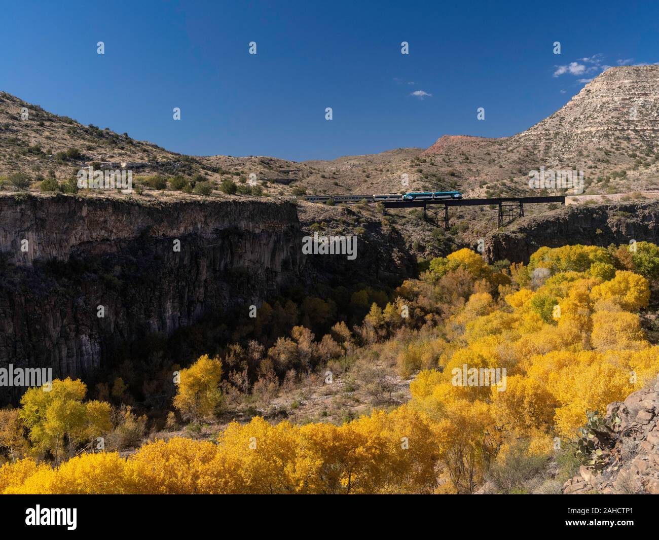 Verde Canyon Railroad, running in autumn above the Verde River, Arizona Stock Photo
