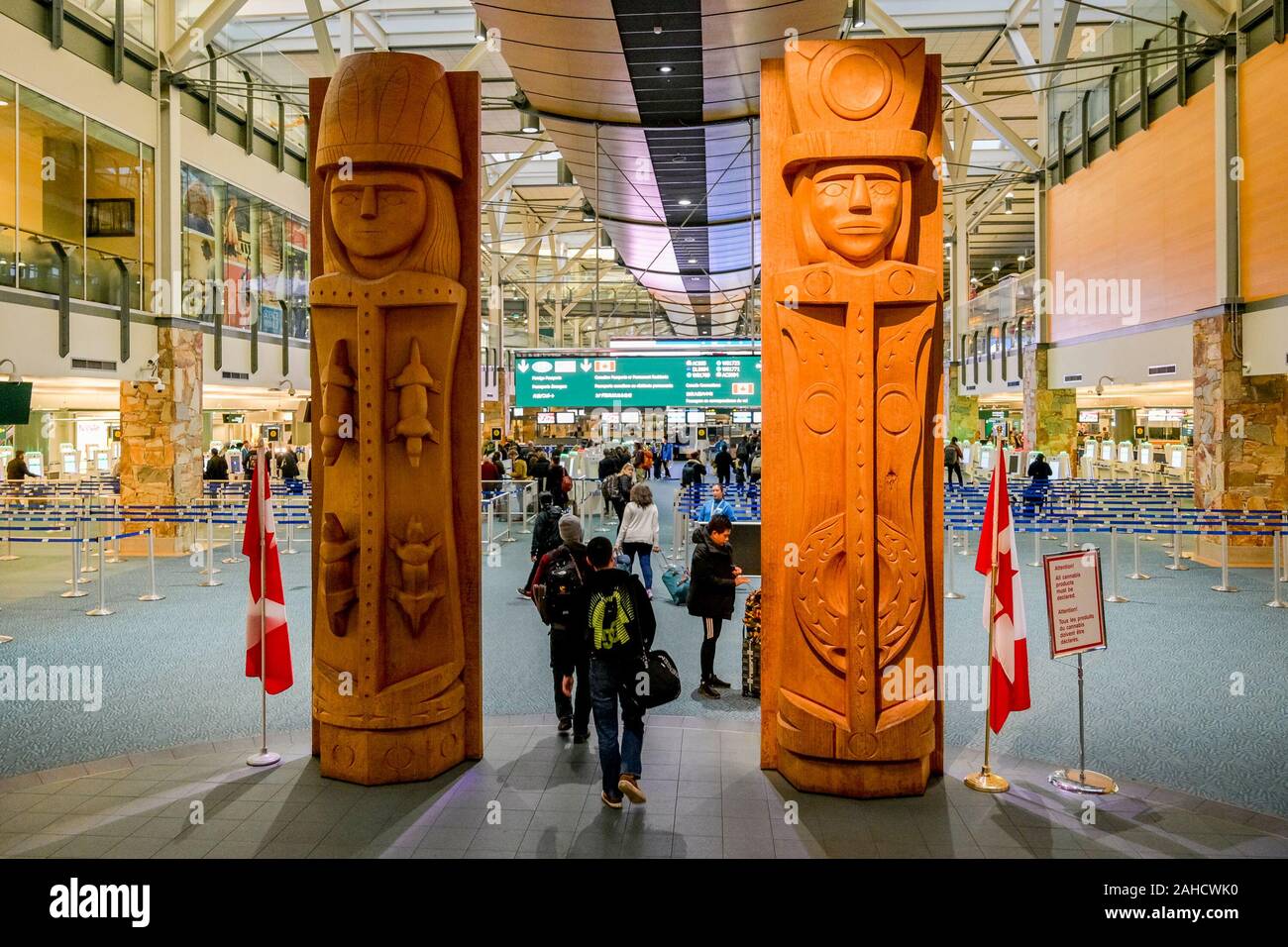 Musqueam Welcome Figures, by Susan Point, Vancouver International Airport, Richmond, British Columbia, Canada Stock Photo