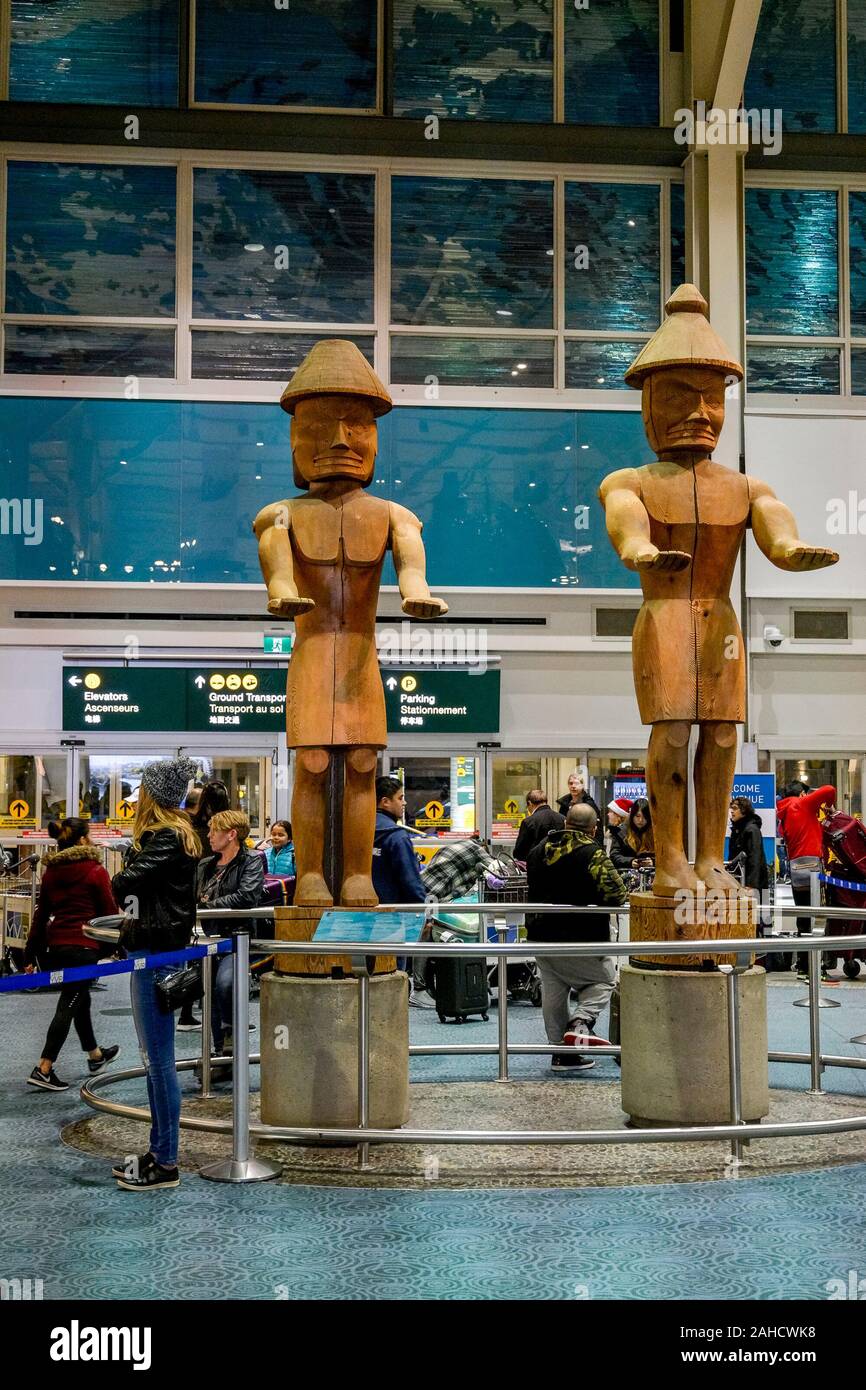 Welcome Figures, artist, Joe David, Vancouver International Airport, Richmond, British Columbia, Canada Stock Photo