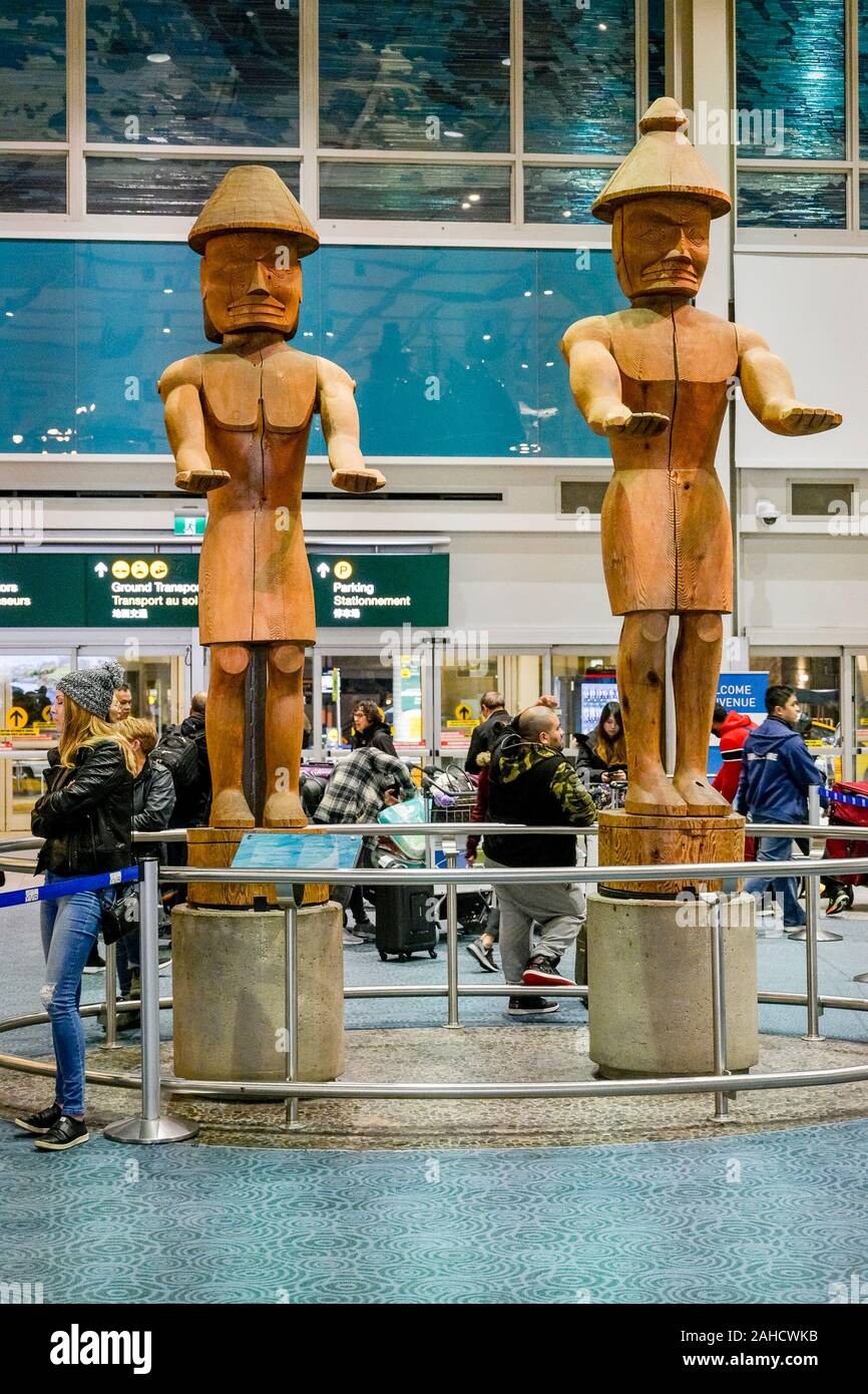 Welcome Figures, artist, Joe David, Vancouver International Airport, Richmond, British Columbia, Canada Stock Photo