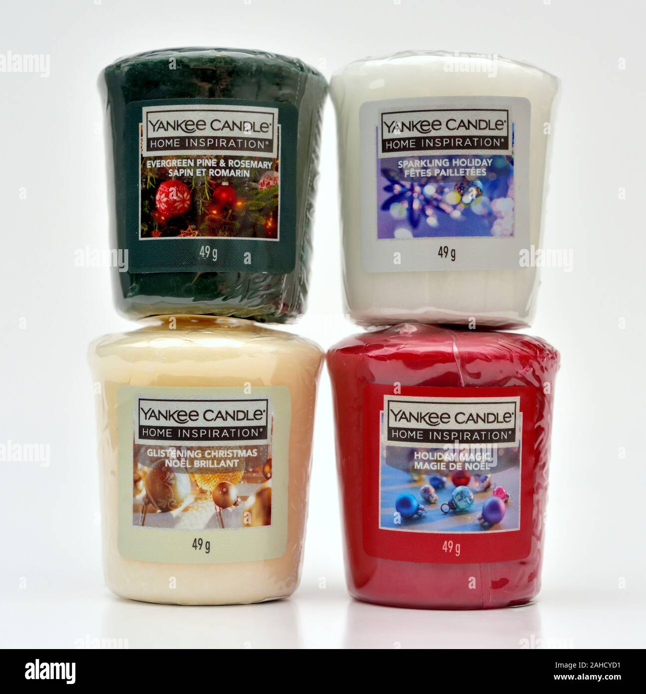 Assorted Yankee candles against white background Stock Photo
