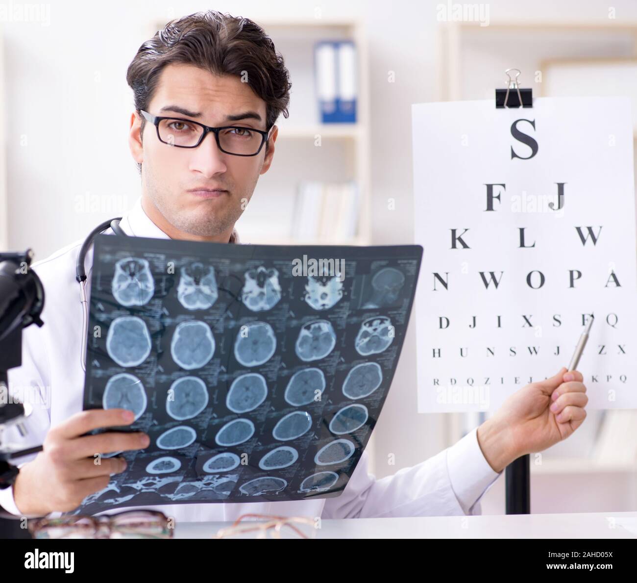 The eye doctor in medical concept Stock Photo Alamy