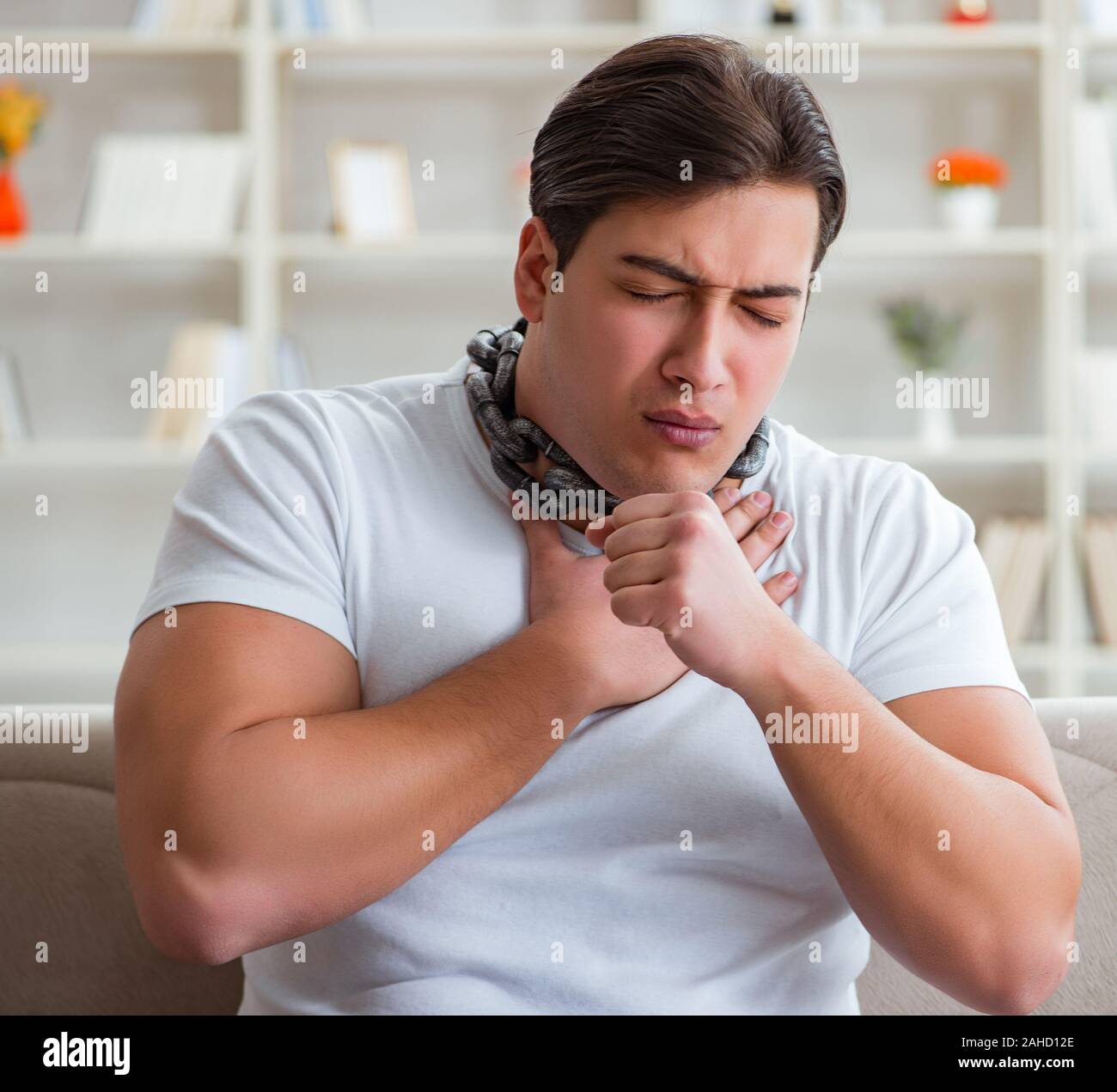 The young man suffering from sore throat Stock Photo Alamy