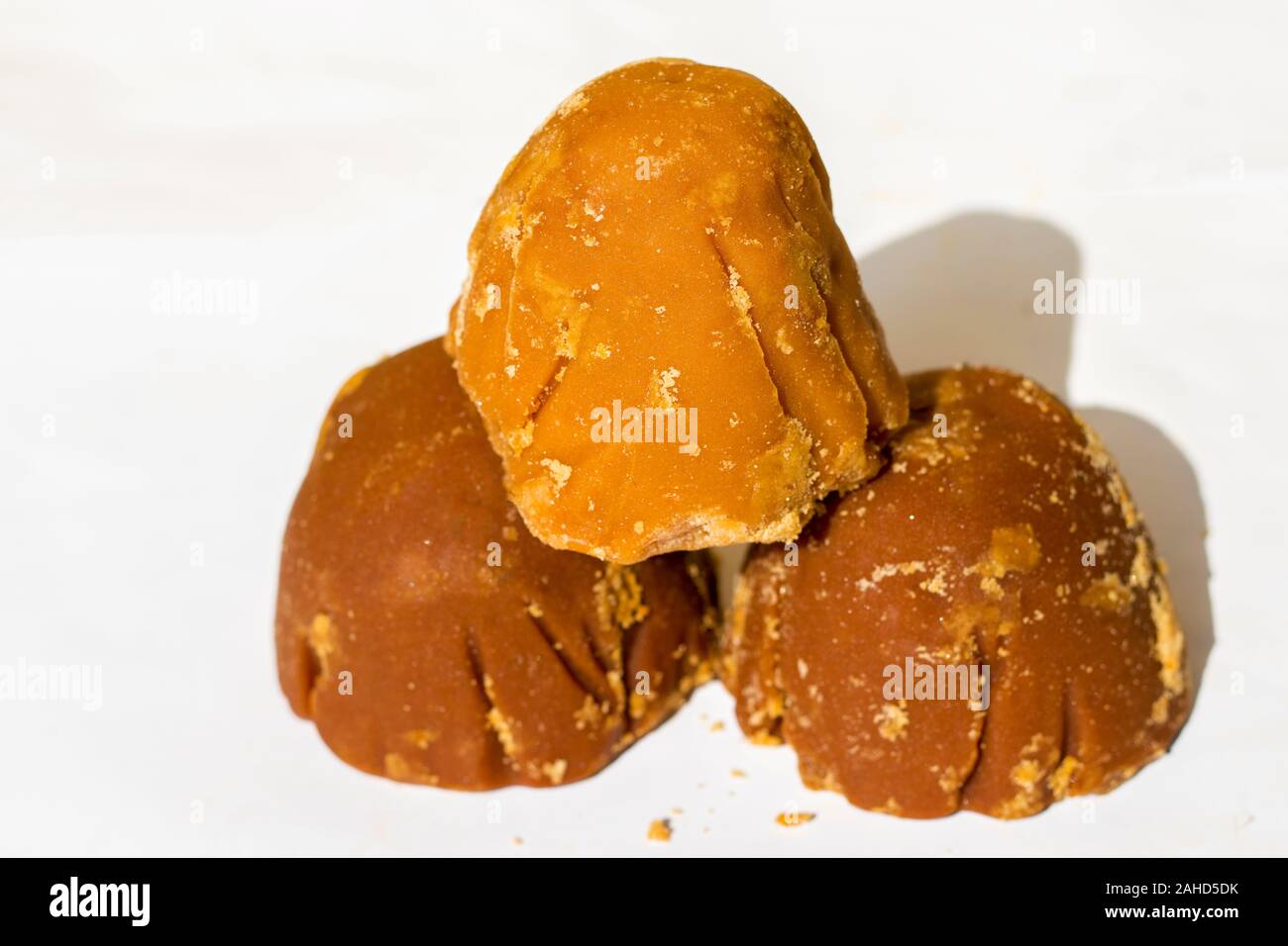 sweet and delicious Jaggery,decorated with wooden background Stock Photo