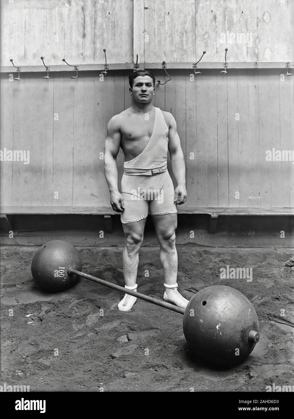 French weightlifter and 1920 Olympic champion Ernest Cadine, showing off his muscles in 1923 Stock Photo