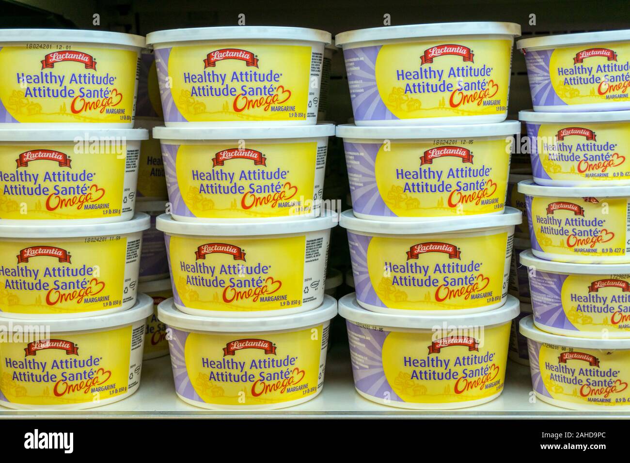 Tubs of Lactantia Healthy Attitude Omega 3 Margarine for sale on the shelves of a Canadian supermarket. Stock Photo