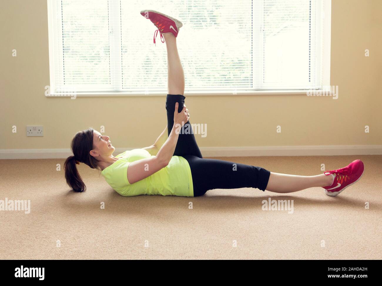 women doing leg lift exercises Stock Photo Alamy
