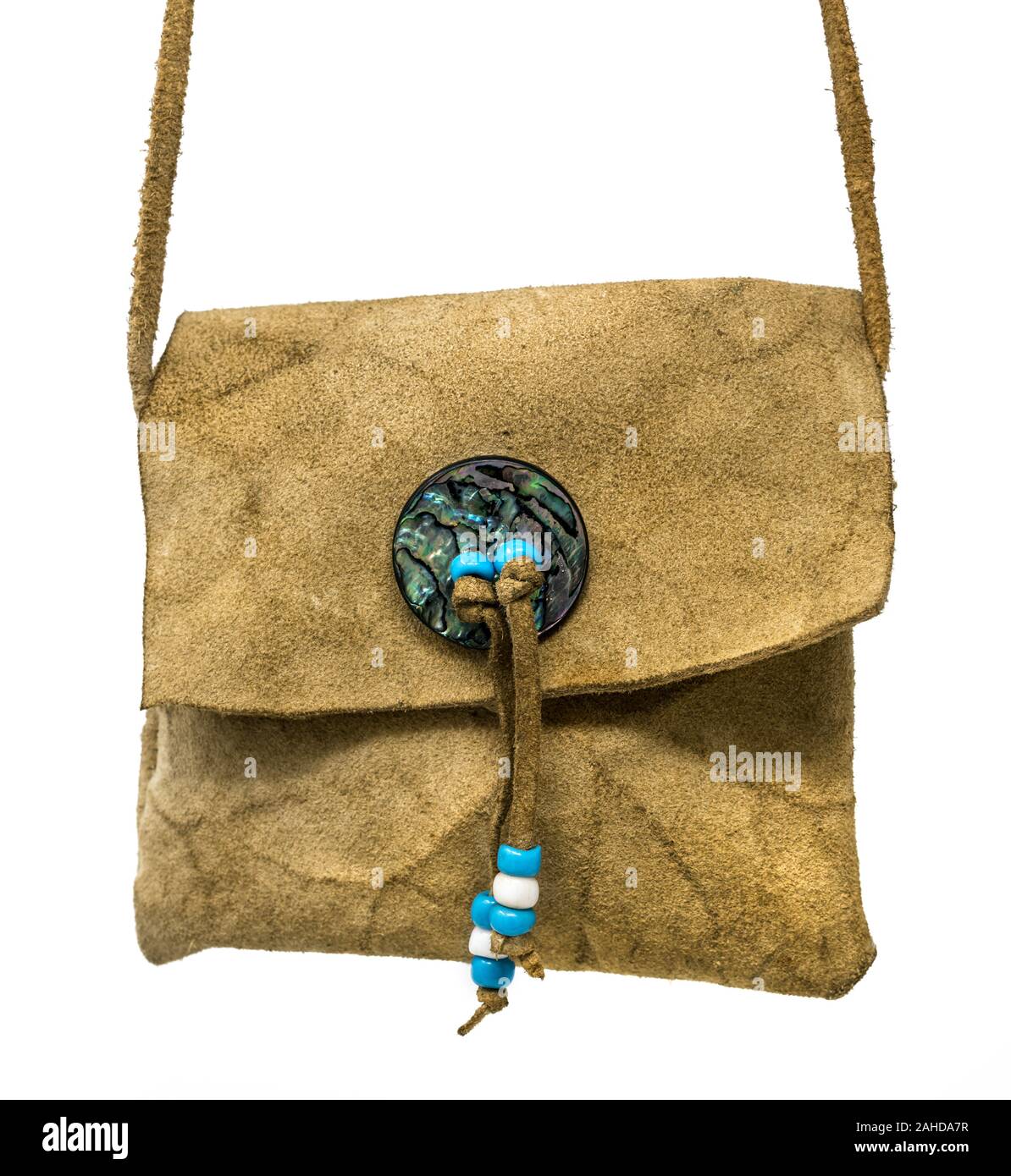 Bag of the North American Indians. Made from deerskin embroidered with colorful glass beads and leather cords isolated on white Stock Photo