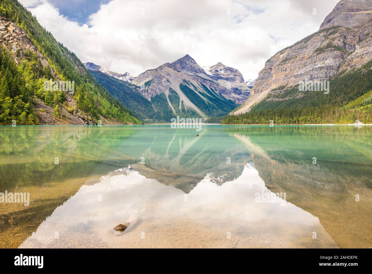 View of mountains reflecting in Kinney Lake at Mount Robson, Canada Stock Photo