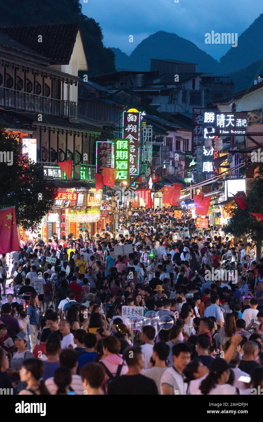Shopping street of Yangshuo. Yangshuo is a popular tourist county and it is a city near to Guilin Guangxi. The main shopping streets of Yangshuo. Stock Photo