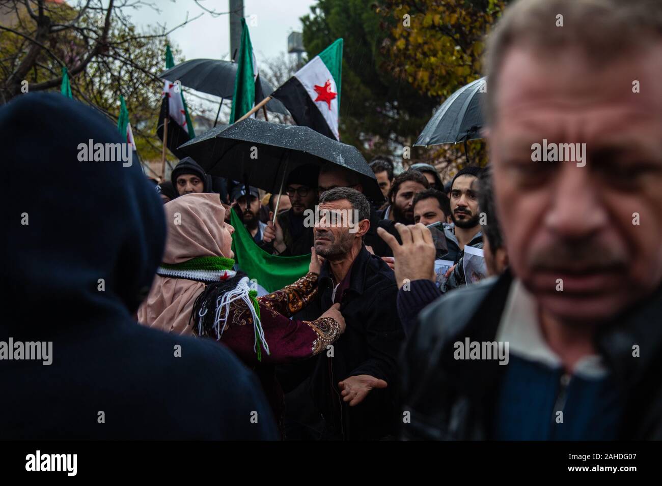 A protester chants slogans during the demonstration.A group of Syrian refugees in Turkey, the city of Gaziantep protest in solidarity with the people in Syria and also hold signs calling for an end to the bombing of the city of Idlib by Russia and the Assad regime. Stock Photo