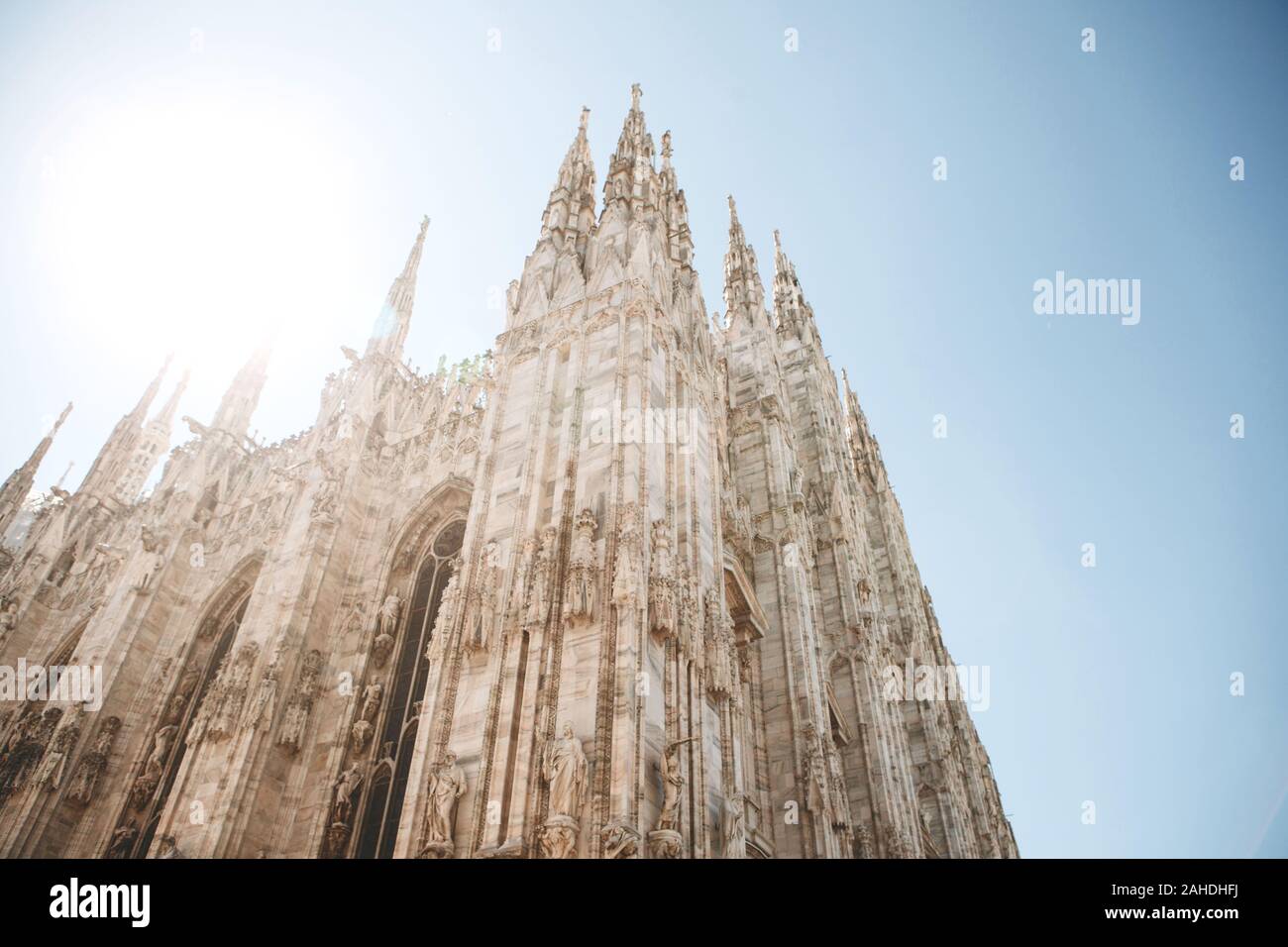 Beautiful view of the ancient Duomo Cathedral in Milan in Italy. It is one of the most popular tourist attractions in Italy. Stock Photo
