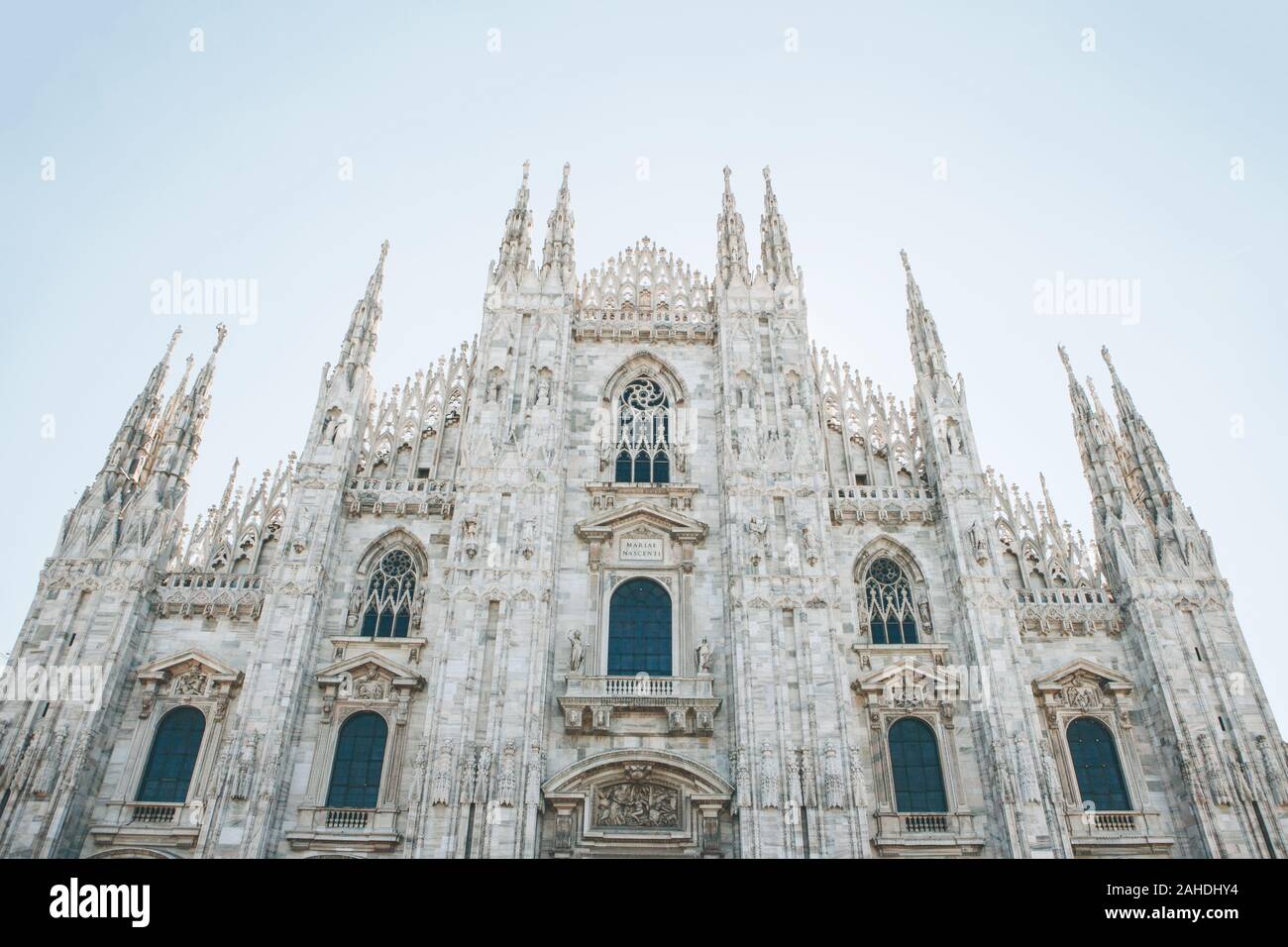 Beautiful view of the ancient Duomo Cathedral in Milan in Italy. It is one of the most popular tourist attractions in Italy. Stock Photo