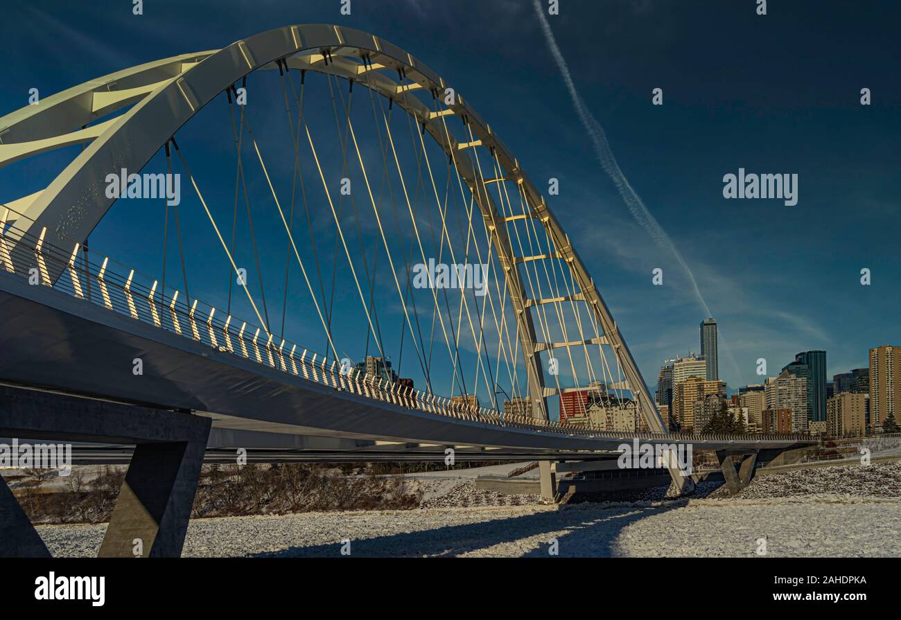 Panoramic view of Walterdale suspension bridge and downtown skyline in Edmonton, Alberta, Canada