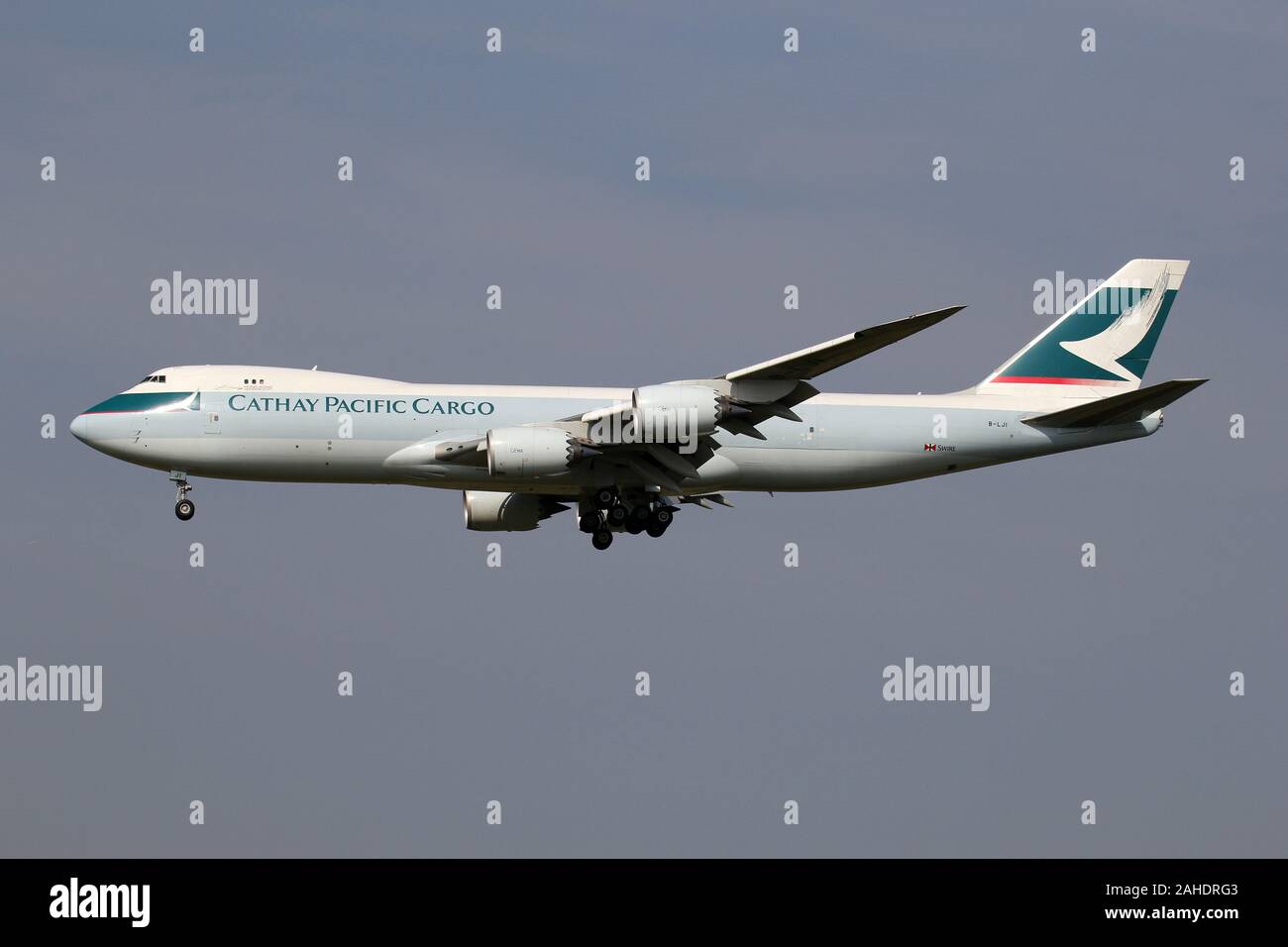 Cathay Pacific Cargo Boeing 747-8F with registration B-LJI on short final for runway 18C of Amsterdam Airport Schiphol. Stock Photo