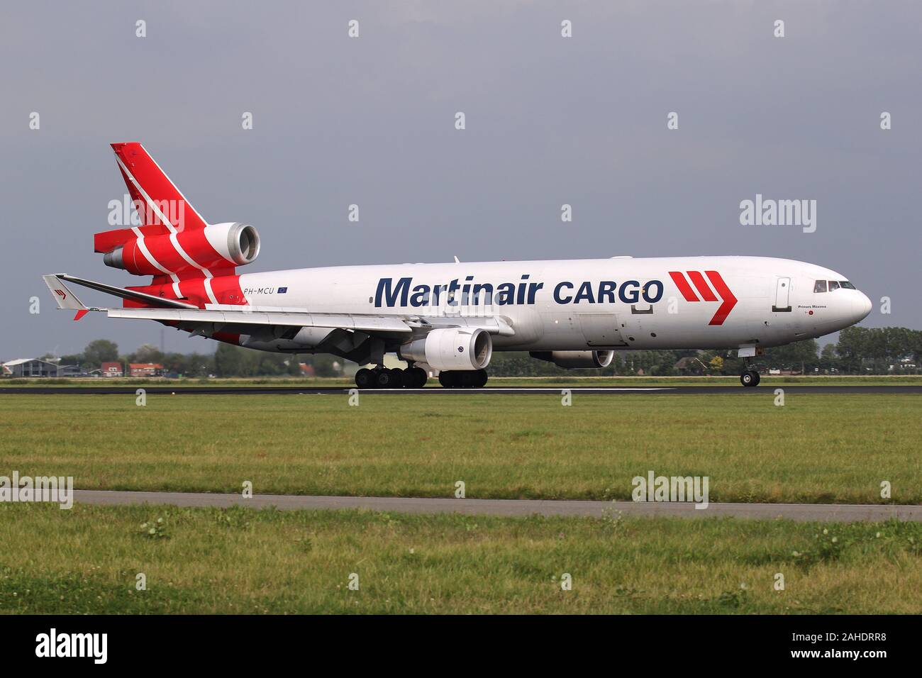 Dutch Martinair Cargo McDonnell Douglas MD-11F with registration PH-MCU just landed on runway 18R (Polderbaan) of Amsterdam Airport Schiphol. Stock Photo