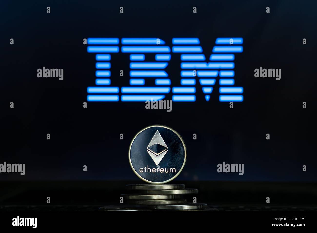 Ethereum coins with IBM logo on a laptop screen. Slovenia, Ljubljana - 02 24 2019 Stock Photo