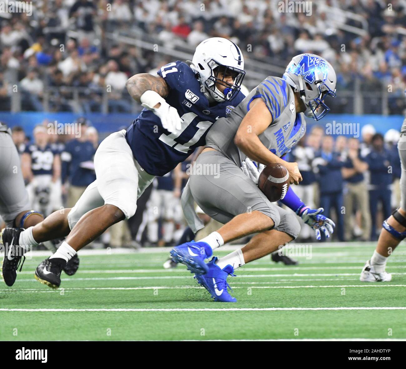 Arlington, United States. 28th Dec, 2019. Penn States Micah Parsons sacks Memphis Tigers quarterback Brady White during the first half of the 84th Goodyear Cotton Bowl Classic on Saturday, December 28, 2019 at AT&T Stadium. Photo by Ian Halperin/UPI Credit: UPI/Alamy Live News Stock Photo