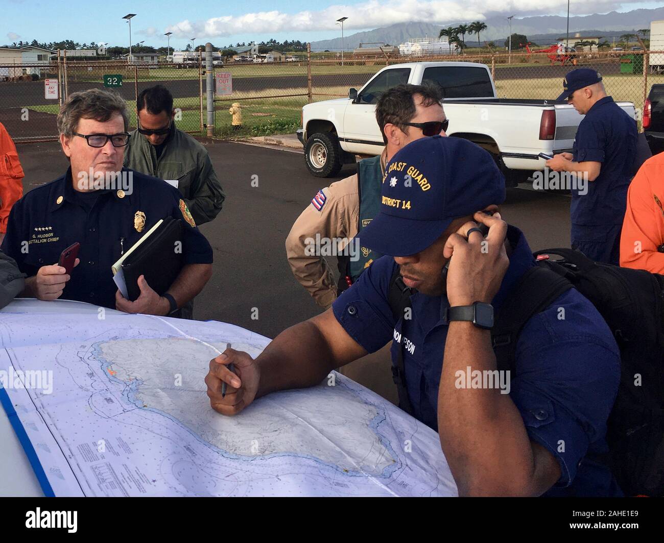 Lihue, United States of America. 27 December, 2019. U.S. Coast Guard and local first responders coordinate Search and Rescue operations for a missing tour helicopter with seven people aboard December 27, 2019 in Lihue, Kauai, Hawaii. The flight seeing helicopter with Safari Helicopters failed to return after a short flight to view the rugged coastline of Na Pali.  Credit: CPO Justin Shackleford/USCG/Alamy Live News Stock Photo