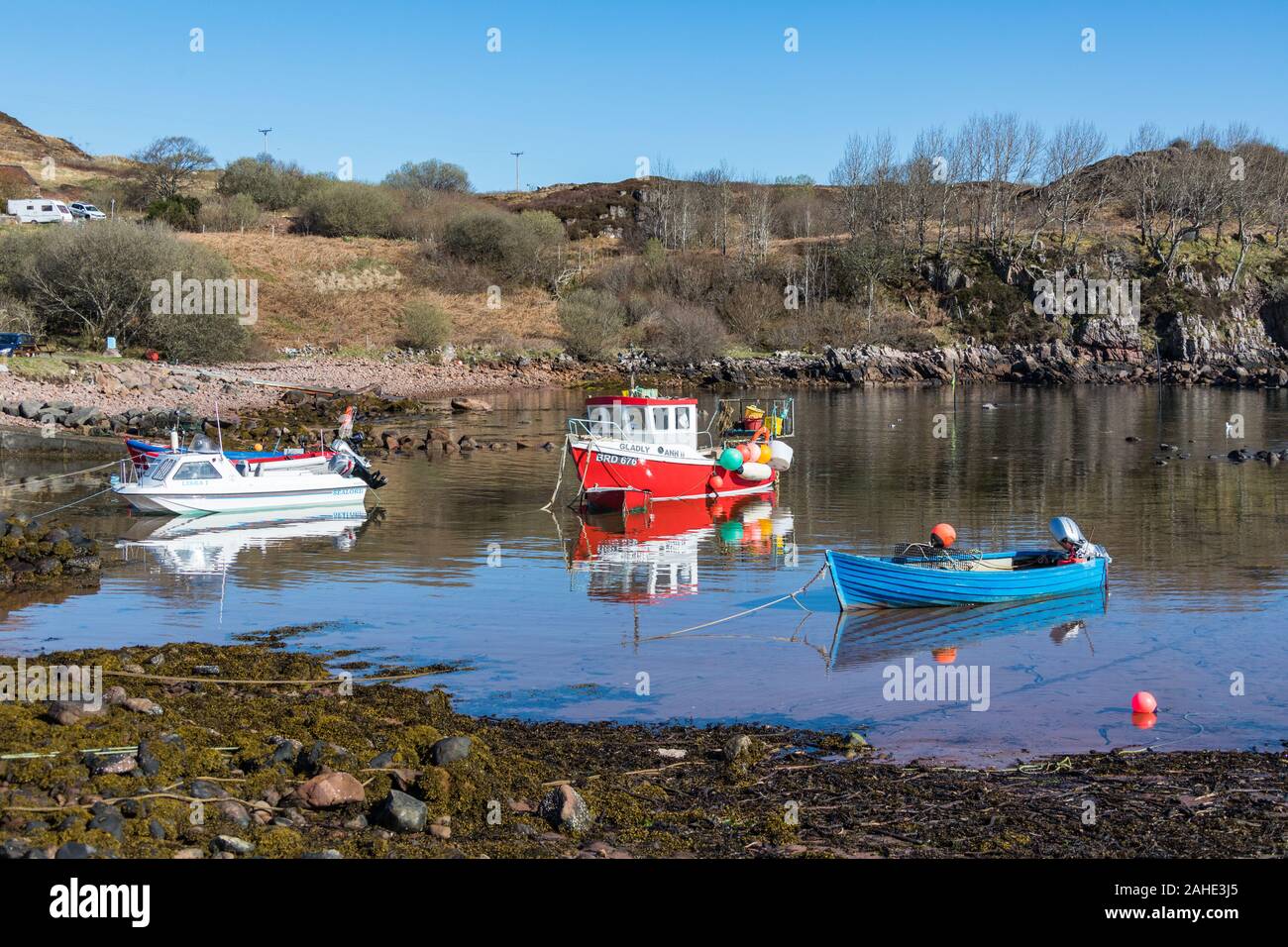 Fishing boats in Cove, located on the northwestern shore of Loch Ewe, Poolewe, Inverasdale, Ross-shire, Scotland. Stock Photo
