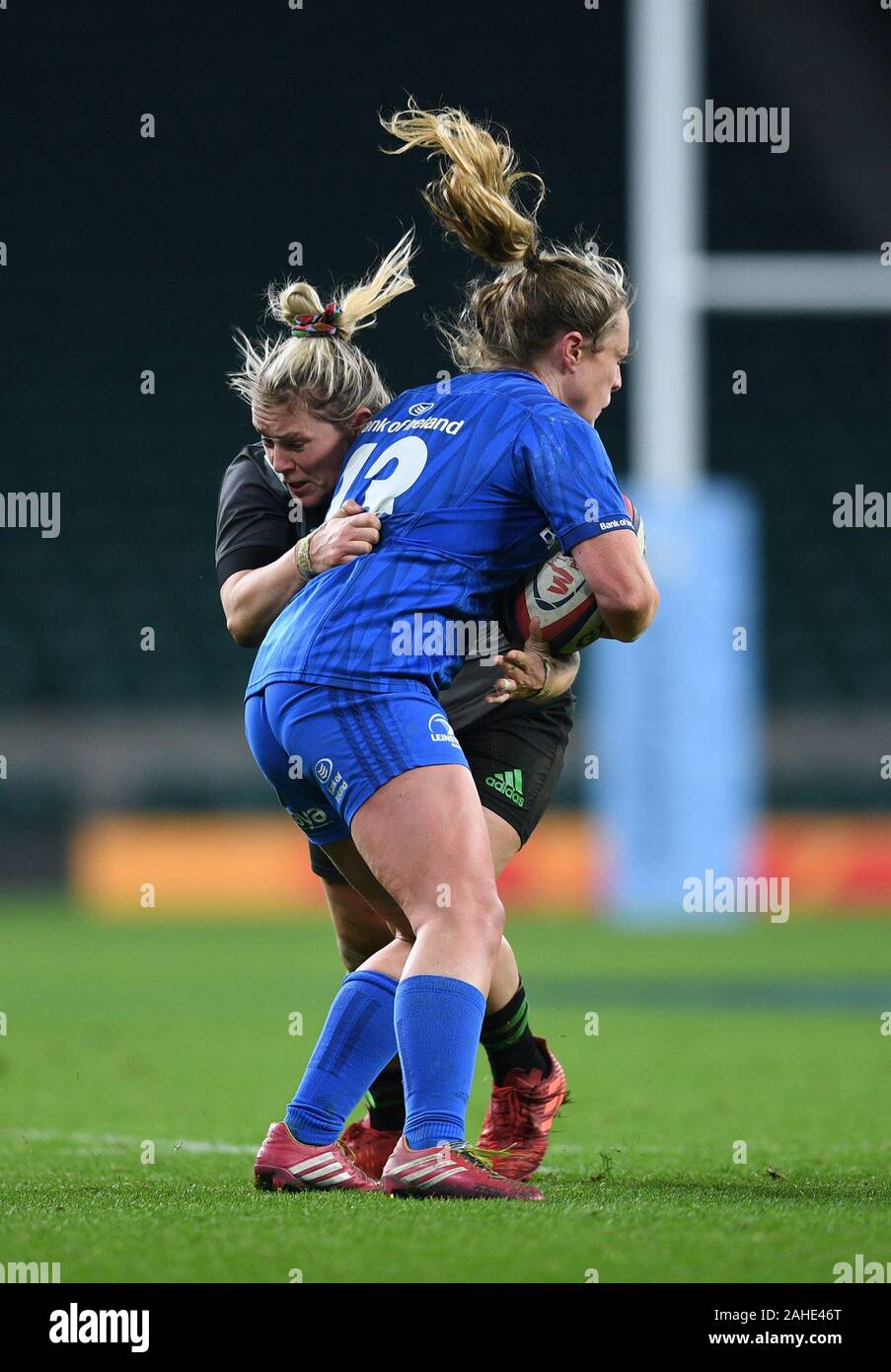Twickenham, London, UK. 28th Dec, 2019. Big Game 12 Womens Rugby, Harlequins versus Leinster; Rachael Burford of Harlequins tackles Elise O'Byrne-White of Leinster - Editorial Use Credit: Action Plus Sports/Alamy Live News Stock Photo