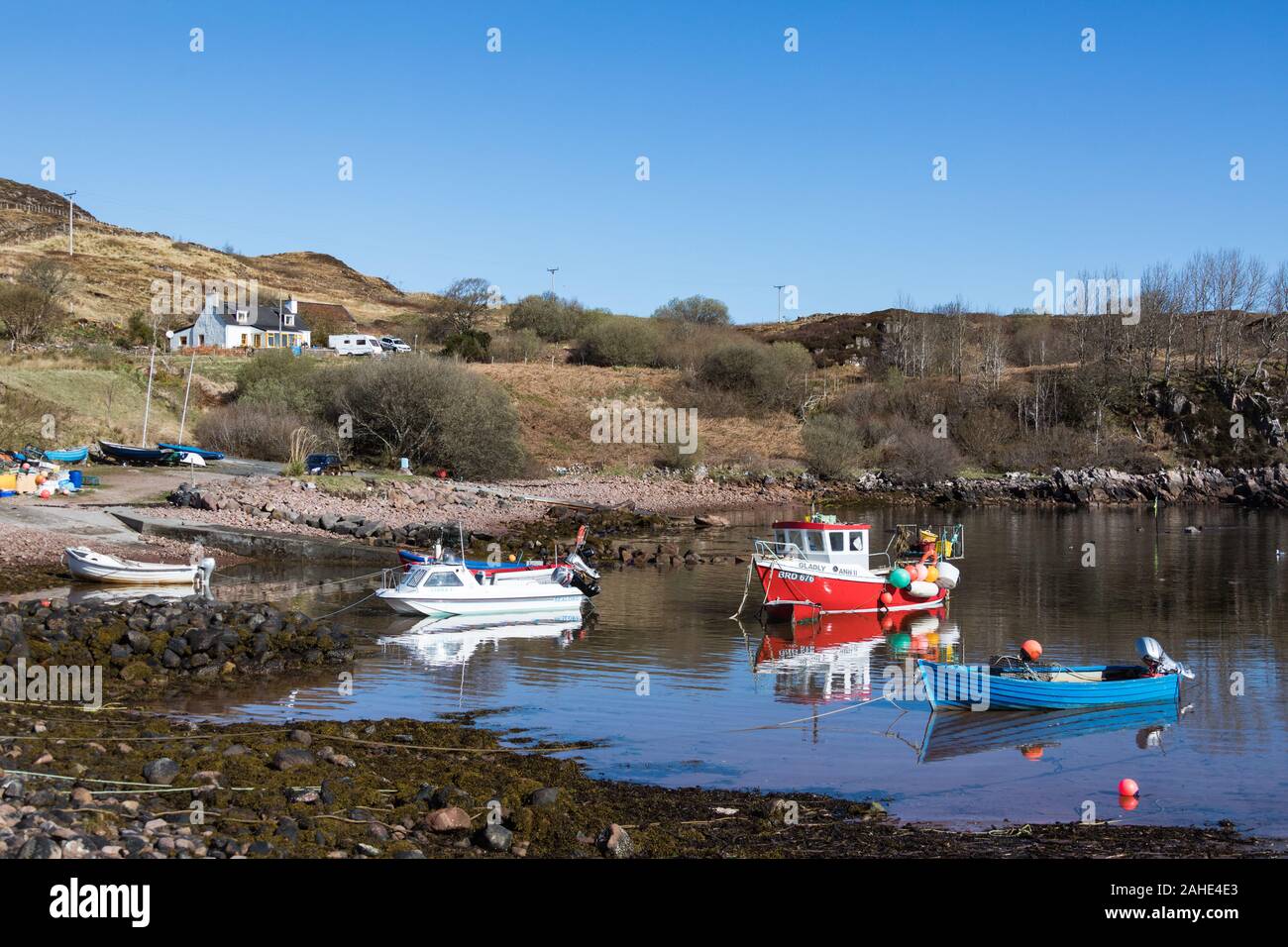 Fishing boats in Cove, located on the northwestern shore of Loch Ewe, Poolewe, Inverasdale, Ross-shire, Scotland. Stock Photo