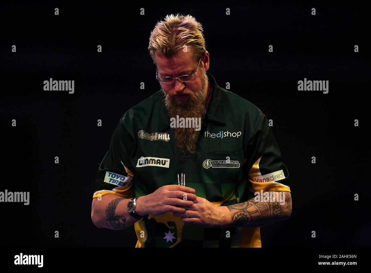 Simon Whitlock after loosing during day thirteen of the William Hill World Championships at Alexandra Palace, London. Stock Photo