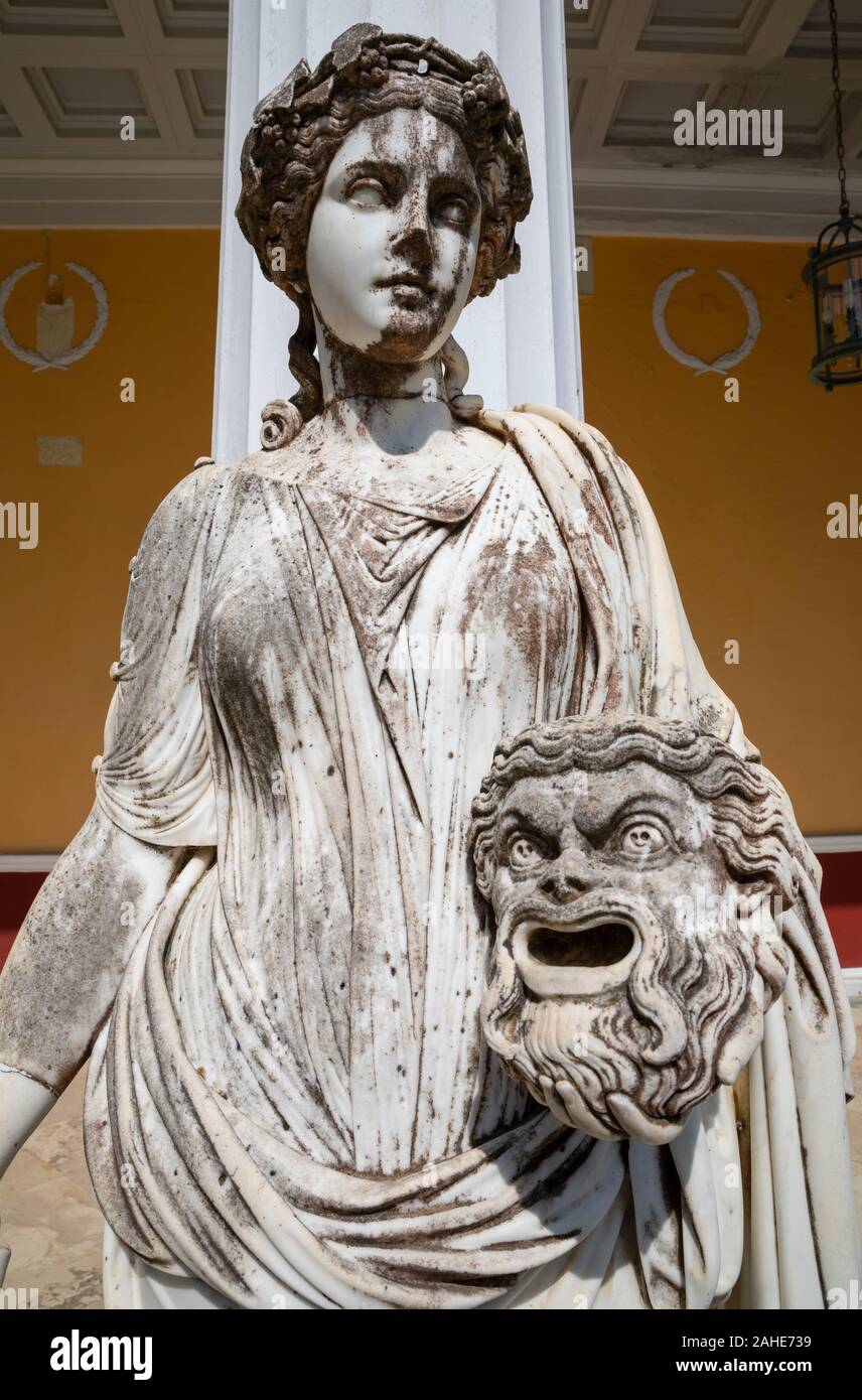 Marble statue of muse Melpomene, the protector of tragedy, in the Courtyard of the Muses, Achilleion Palace, Corfu, Greece Stock Photo