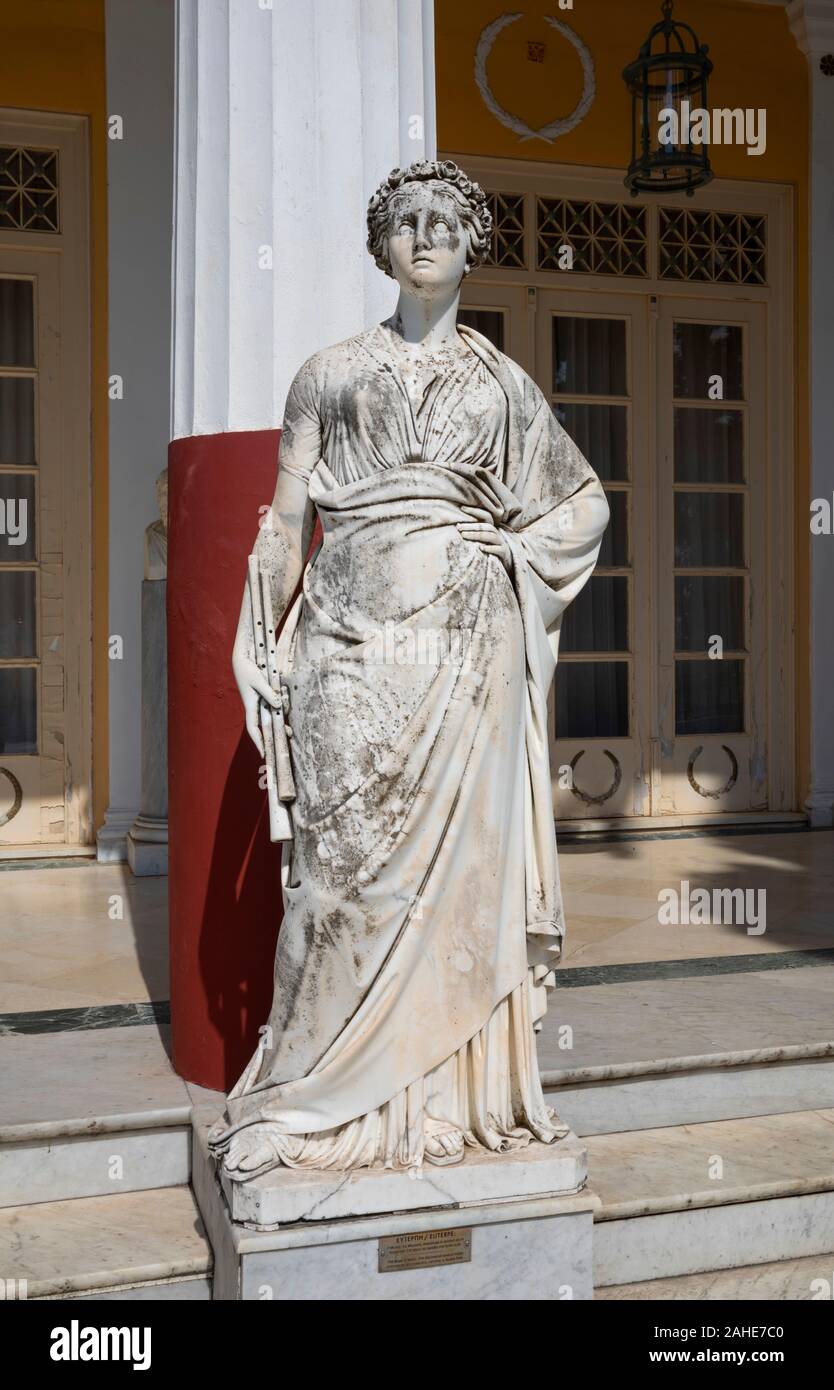 Marble statue of Euterpe, muse of Music, in the Courtyard of the Muses, Achilleion Palace, Corfu, Greece Stock Photo