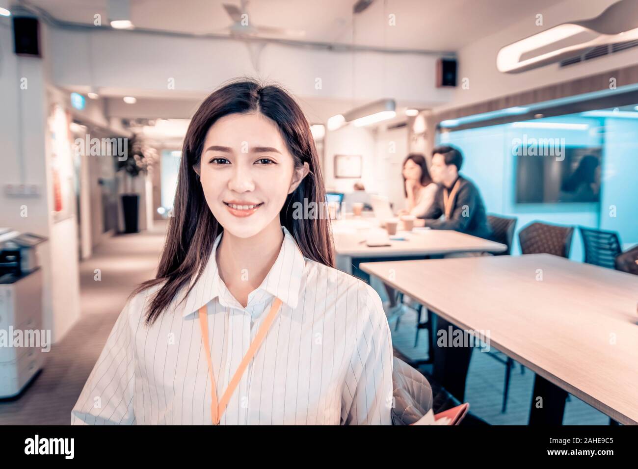 young business woman working with her staff in office Stock Photo