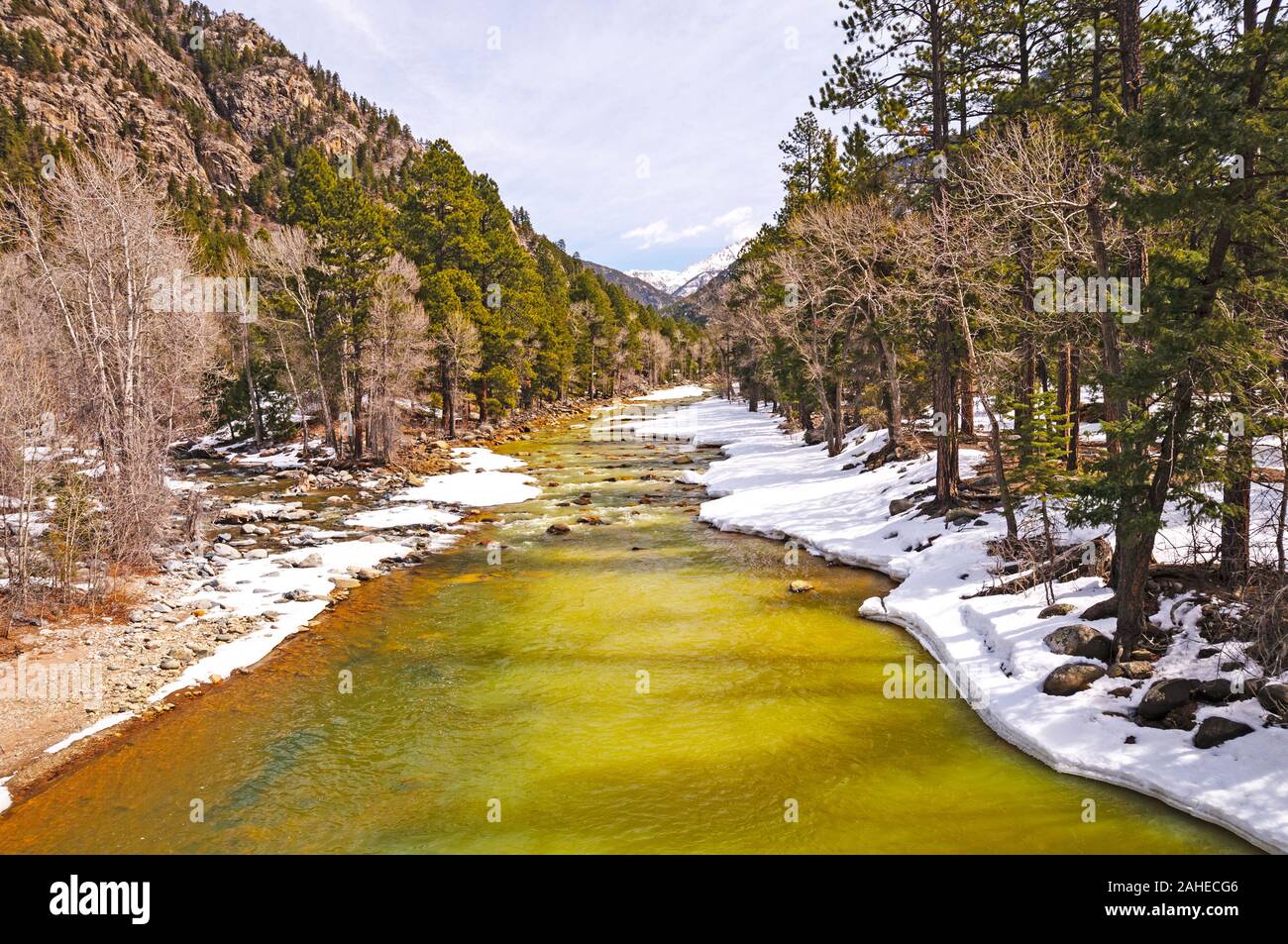 The Animas River in Colorado with early spring snow Stock Photo