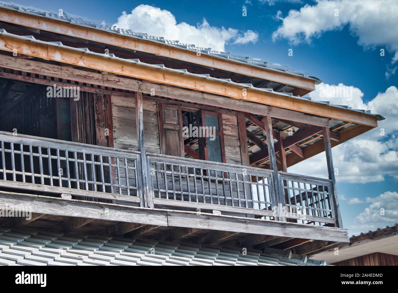 This unique photo shows an old abandoned wooden house with a beautiful ...