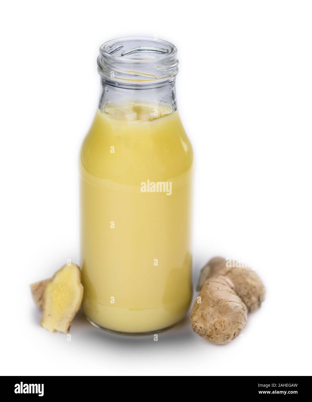 Ginger Juice as detailed close-up shot isolated on white background (selective focus) Stock Photo