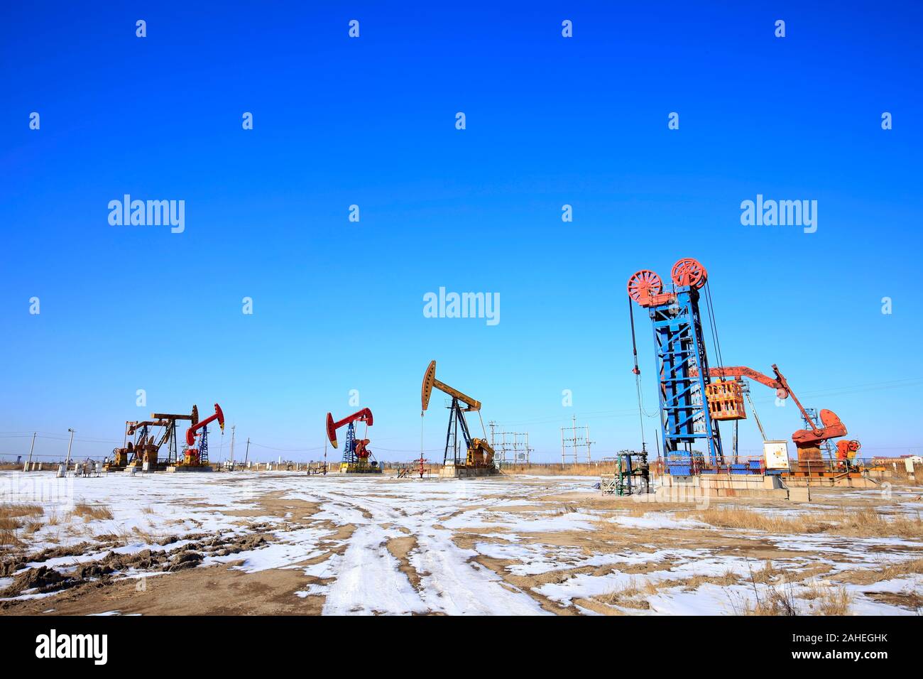 Oil fields, pumping units work Stock Photo - Alamy