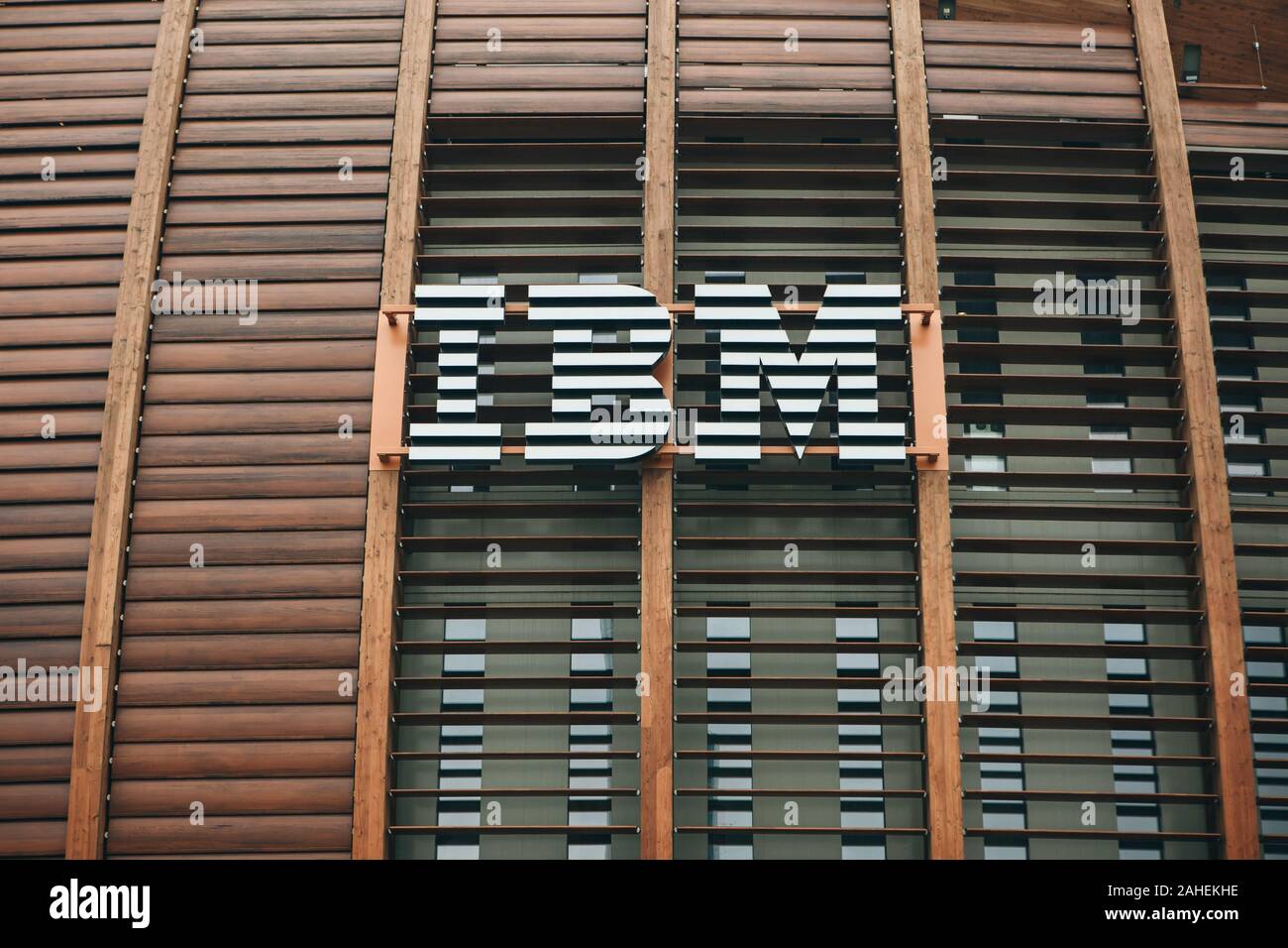 Italy, Milan, May 30 2019 Close-up signboard on modern futuristic IBM building Stock Photo