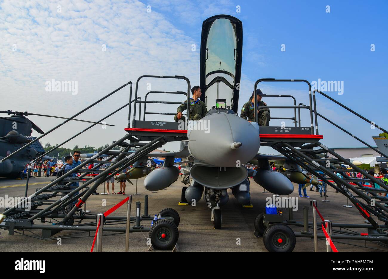 Singapore - Feb 10, 2018. A General Dynamics F-16 Fighting Falcon aircraft belong to the Singapore Air Force on display in Changi, Singapore. Stock Photo