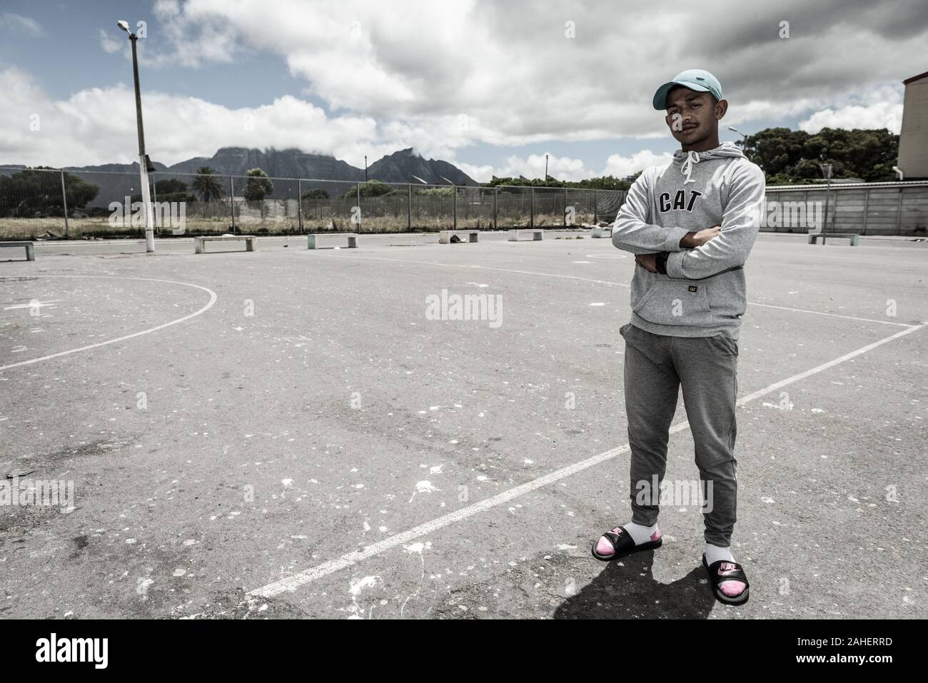 A gangster poses in the South African Cape Town suburb of Hanover Park, where crime and violence haunts the impoverished 'Coloured' neighbourhood Stock Photo