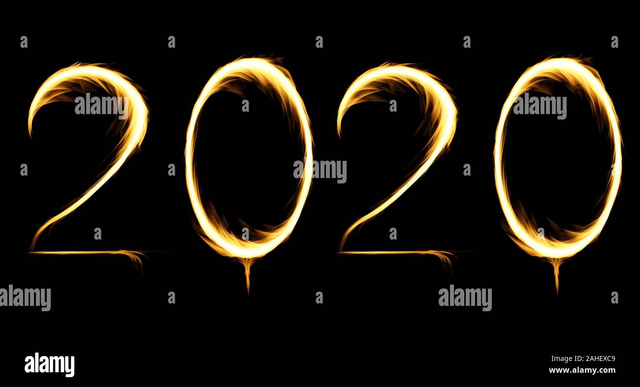 2020 Happy new year burning party flames isolated on black. Stock Photo