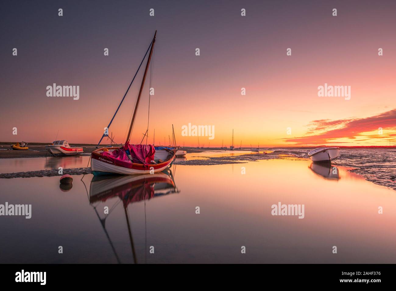 Dawn at Mow Creek in Brancaster Staithe on the north Norfolk coast. Stock Photo