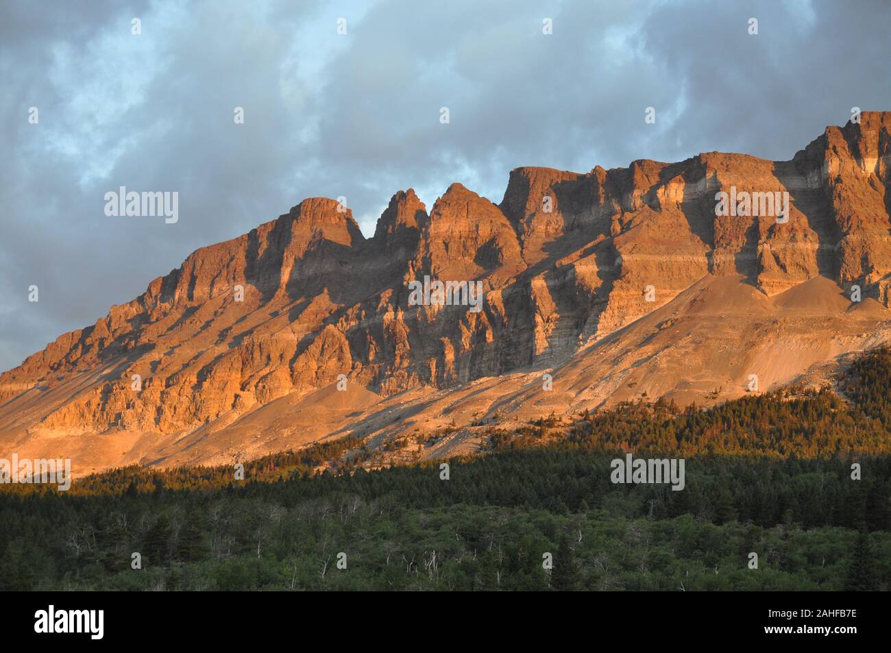 Colored Rocks Tourist Colored rock at Glacier National Park Stock Photo - Alamy