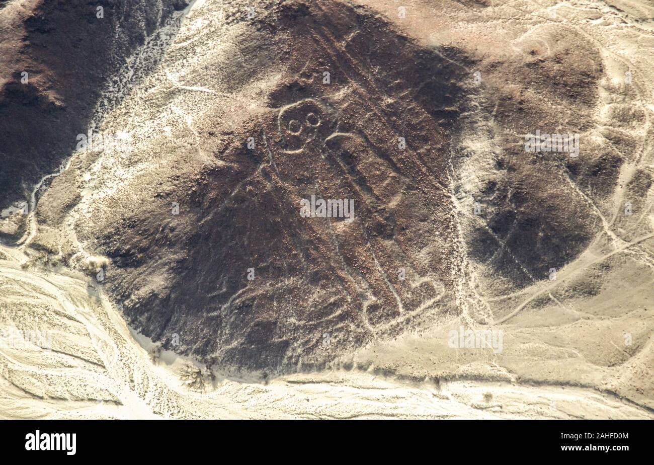 Aerial view of the astronaut. The Nazca Lines are a group of very large geoglyphs formed by depressions or shallow incisions made in the soil of the N Stock Photo