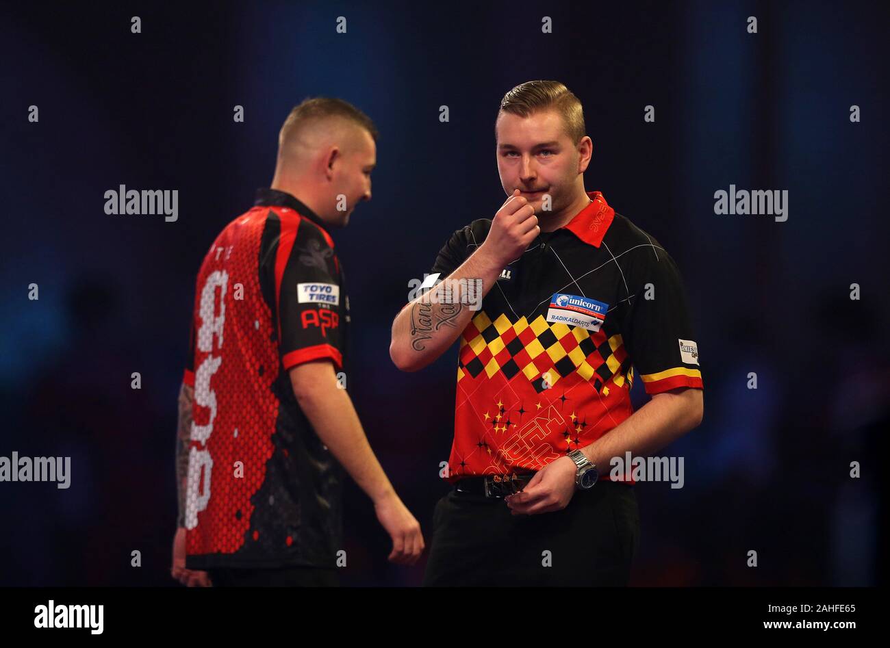 Dimitri Van Den Bergh And Nathan Aspinall During Day Fourteen Of The William Hill World Championships At Alexandra Palace London Stock Photo Alamy