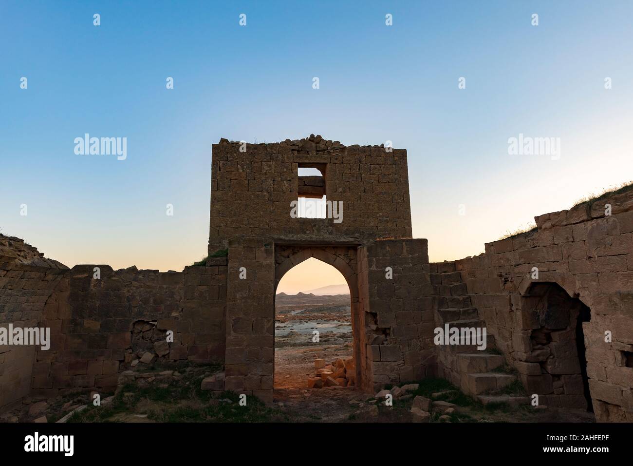 The main entrance to the ancient Caravanserai in the desert Stock Photo