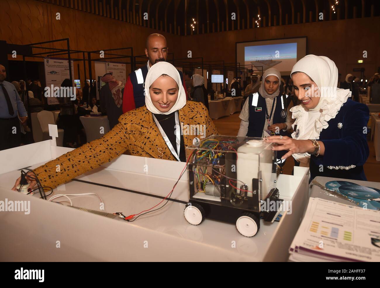 Kuwait City, Kuwait. 29th Dec, 2019. People visit an engineering design exhibition in Kuwait City, Kuwait, Dec. 29, 2019. The exhibition was held here Sunday, which features 107 graduation projects of Kuwaiti students, and aims to encourage students to search for scientific information and to document their achievements. Credit: Asad/Xinhua/Alamy Live News Stock Photo